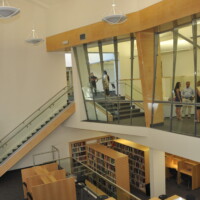 Guests at the Kutler Center ribbon cutting ceremony explore the newly dedicated building.