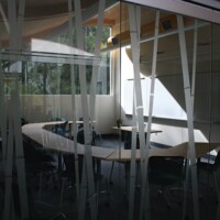 The bamboo etched glass doors to a classroom.